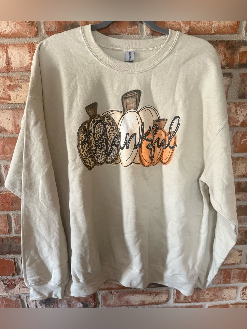 Gildan Cream Crewneck Sweater with Pumpkin 'Thankful' Graphic